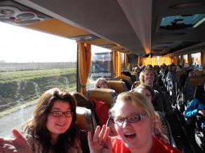 Allie and Josey wave hello on the way to Brussels