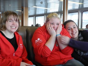 Taina, Josie and Leah sit at the front of the ferry.